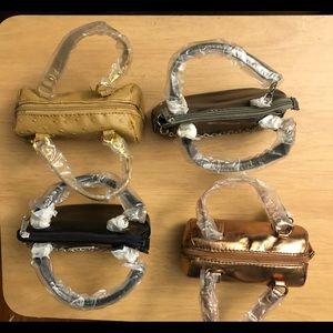 Susan Graver purses that never been used.